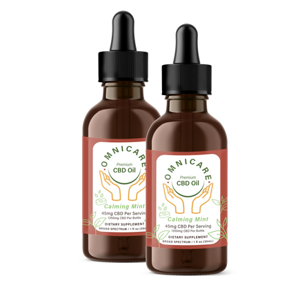 Two bottles of Omnicare CBD Calming Mint 45mg Oil on a white background